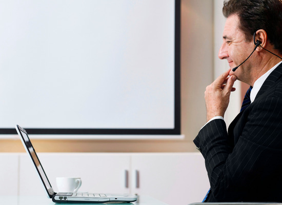 man listening video call